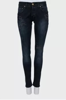Dark blue ripped jeans