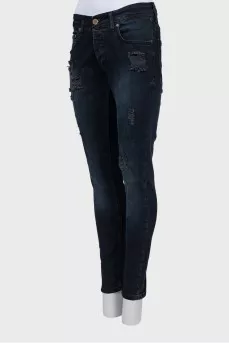 Dark blue ripped jeans