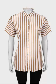 Striped shirt with slits on the sides