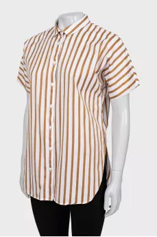 Striped shirt with slits on the sides