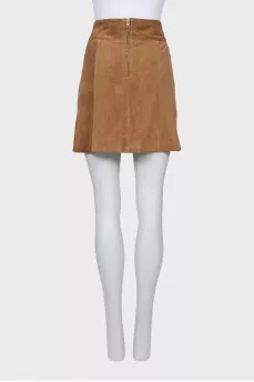 Suede skirt decorated with buttons