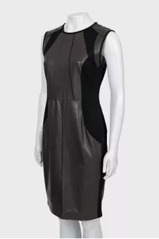 Dress with leather inserts and tag
