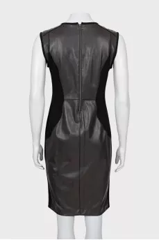 Dress with leather inserts and tag