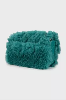 Crossbody bag decorated with fur