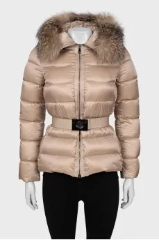 Beige down jacket with fur on the hood