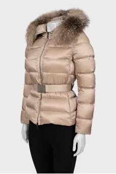 Beige down jacket with fur on the hood