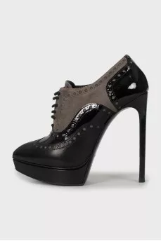 Perforated suede and leather ankle boots