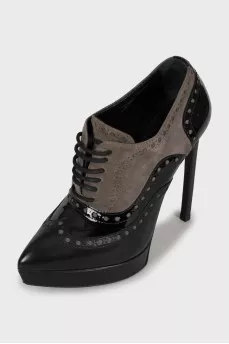 Perforated suede and leather ankle boots