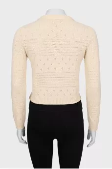 Cropped sweater with perforations