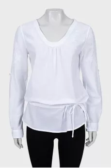 White blouse decorated with embroidery