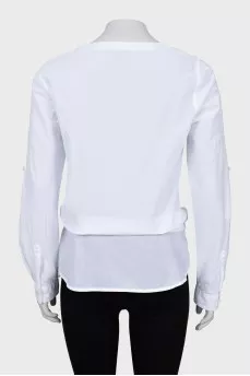White blouse decorated with embroidery