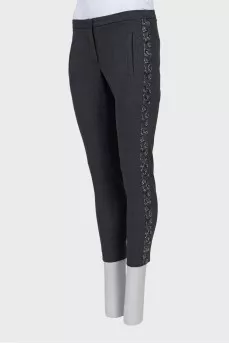 Short trousers decorated with rhinestones