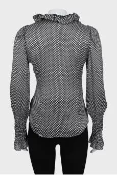 Black blouse with white polka dots