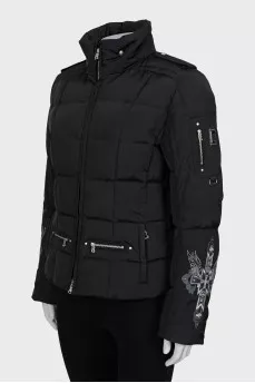 Quilted jacket with embroidered sleeves