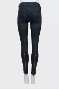 Blue skinny fit jeans with zipper at the bottom