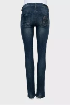 Skinny jeans with skull back