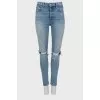 High-waisted jeans with ripped effect