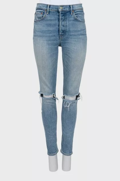 High-waisted jeans with ripped effect