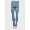 High-waisted jeans with ripped effect