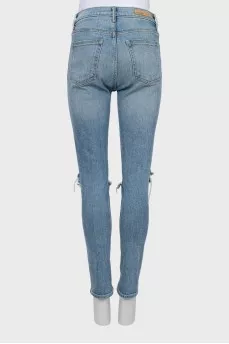 High-waisted jeans with ripped effect
