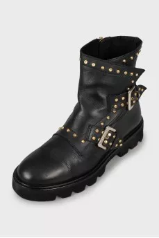 Leather boots with golden decoration