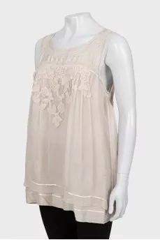 Beige sleeveless blouse