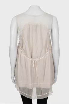 Beige sleeveless blouse