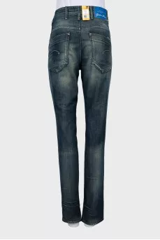 Jeans with patch pockets and tag