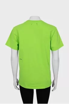 Green T-shirt with text print