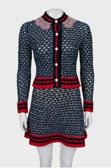 Knitted suit with cardigan and skirt