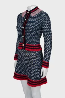 Knitted suit with cardigan and skirt