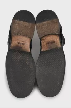 Black leather boots with perforations