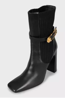 Leather ankle boots with figured heels