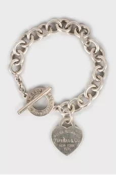 Silver bracelet with heart pendant