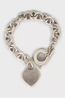 Silver bracelet with heart pendant