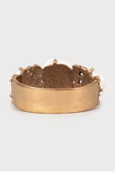 Metal bracelet decorated with flowers