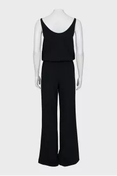 Black jumpsuit decorated with chain