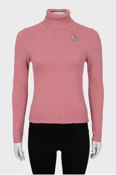 Knitted golf shirt decorated with rhinestones