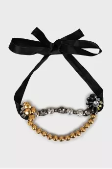 Necklace with golden beads