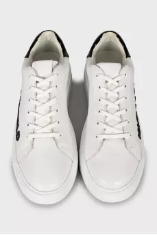 White sneakers with brand logo
