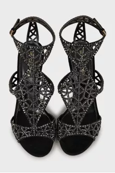Suede sandals decorated with rhinestones
