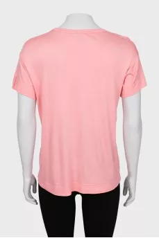 Pink T-shirt decorated with sequins