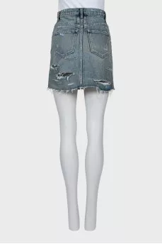 Denim skirt decorated with chains