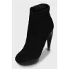 Suede ankle boots with figured heels