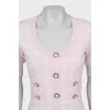 Plaid dress decorated with buttons