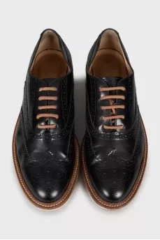 Leather brogues with brown laces