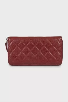 Red wallet with embossed leather