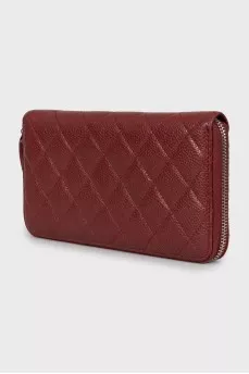 Red wallet with embossed leather