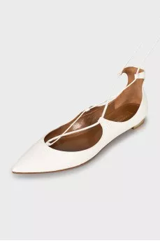 White ballet flats with ties