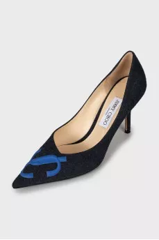 Textile shoes with embossed logo